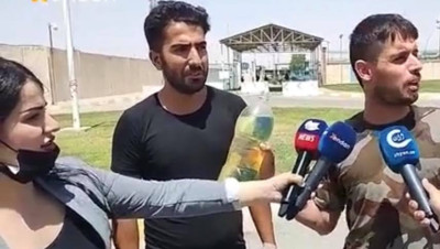 أمام عدسات الكاميرات.. إيراني يضرم النار بنفسه في أربيل قائلا: "إن عدت لإيران سأعدم" (فيديو)