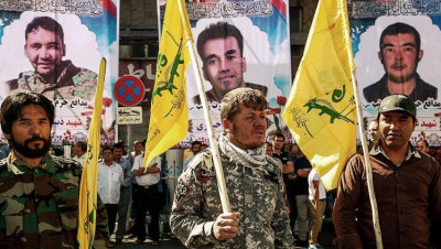 إيران تكافئ عائلات قتلى "فاطميون" بسوريا