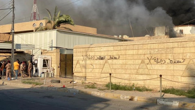 ميليشيات مسلحة تحرق مبنى قناة عراقية