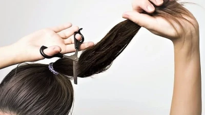 تفسير حلم قص الشعر للعزباء: دلالات التغيير والفرج