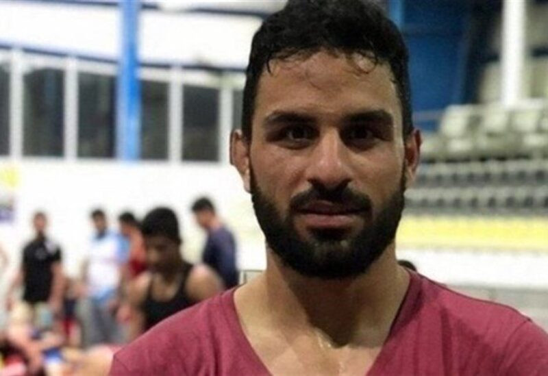 مزاعم جديدة للقضاء الإيراني بشأن إعدام بطل المصارعة ووالده يبعثان برسالة