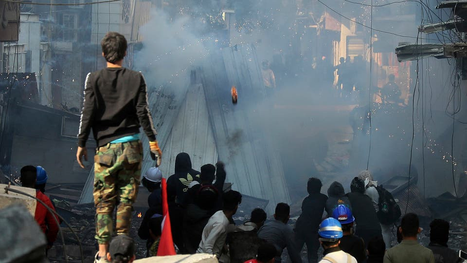 العراق.. إضرام النار بقنصلية إيران بالنجف وفتح تحقيق بمجزرة ذي قار